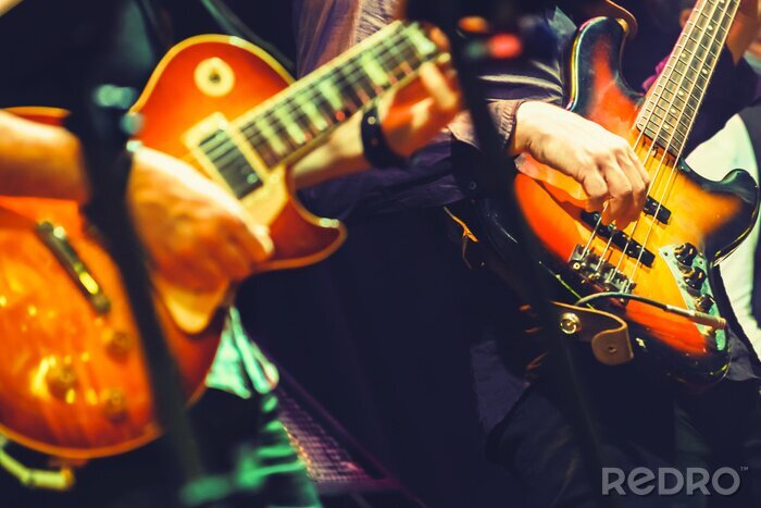 Papier peint  Guitares à un concert de rock