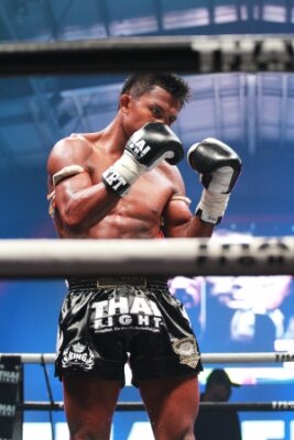 Papier peint  Homme pendant un combat de boxe