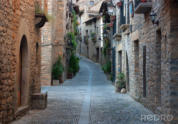 Papier peint  Immeubles en pierre et rue en Espagne
