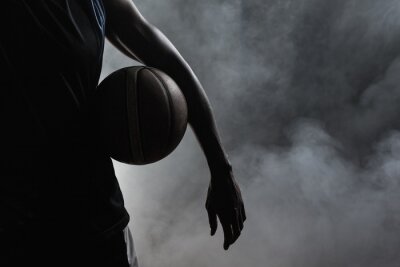 Papier peint  joueur de basket-ball sur fond brumeux