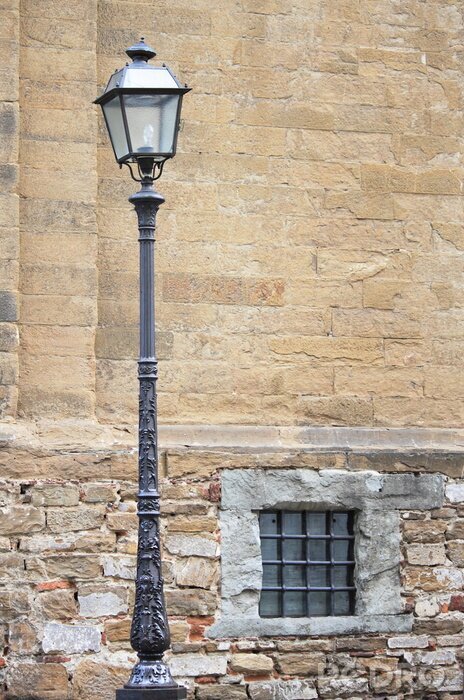 Papier peint  Lampadaire près d'une maison beige