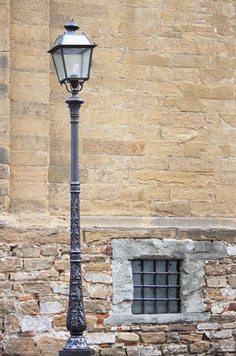 Papier peint  Lampadaire près d'une maison beige
