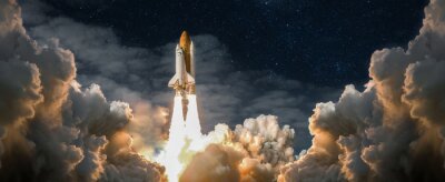 Papier peint  Lancement d’un vaisseau spatial la nuit au milieu des nuages