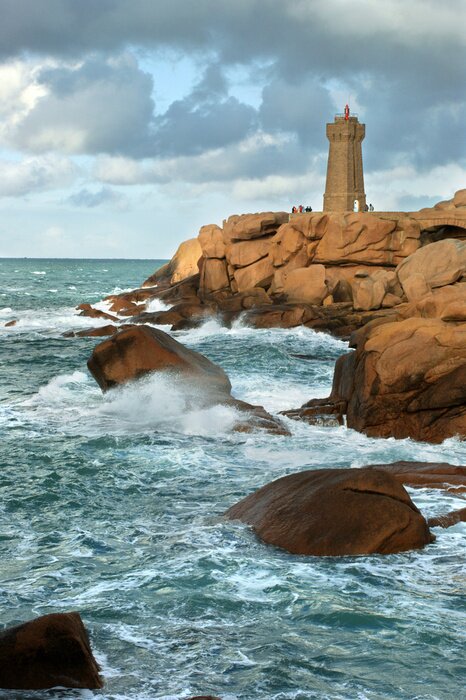 Papier peint  Les rochers du phare et la mer