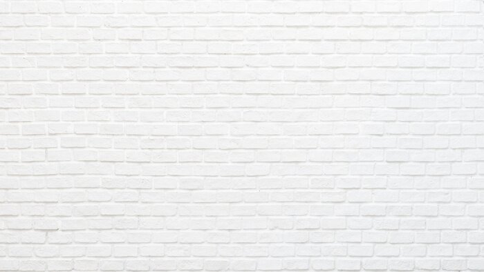 Papier peint  Lumière sur un mur de briques blanches