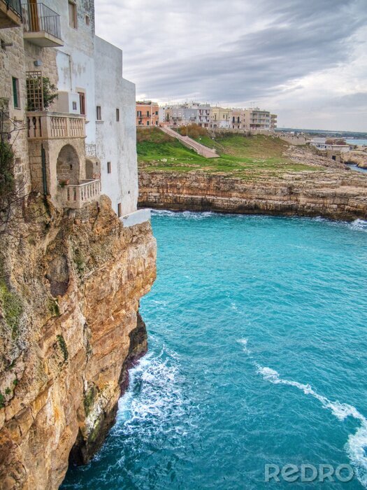 Papier peint  Maison sur une falaise en bord de mer