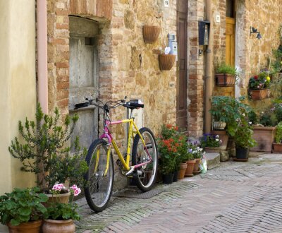 Papier peint  Maisons en pierre et vélo de couleur