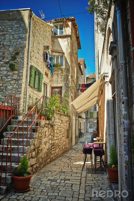 Papier peint  Maisons hautes ruelle en pierre