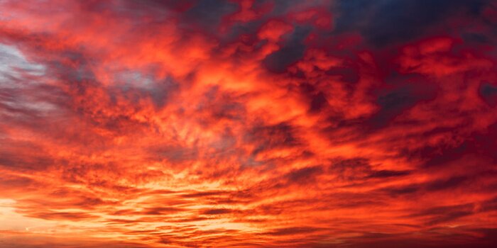Papier peint  Nuages rouges au coucher du soleil