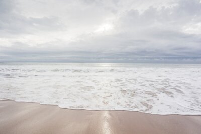Papier peint  Ocean, sea, sand beach with black clouds on horizon. Zen picture (France-Vendée-Les Sables-d'Olonne)