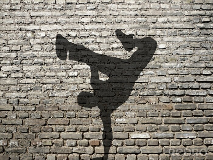 Papier peint  Ombre de breakdancer sur un mur