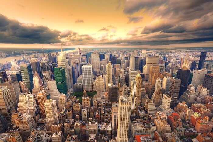 Papier peint  Panorama du coucher de soleil jaune en ville