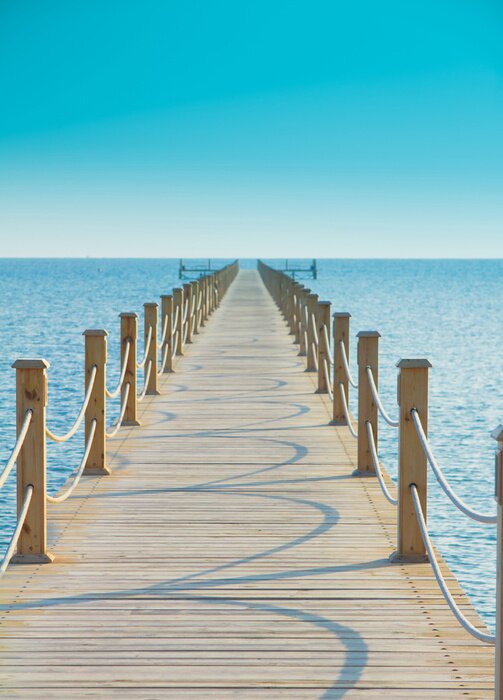 Papier peint  Passerelle sur fond de ciel d'azur