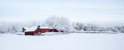 Paysage d'hiver avec une ferme