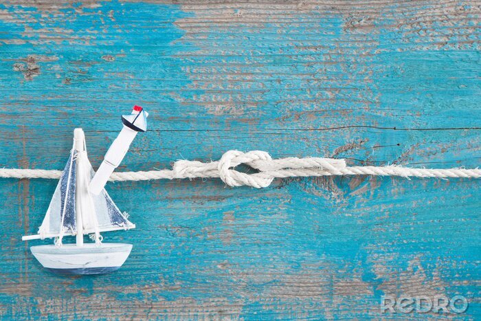 Papier peint  Petites cordes bois et petit voilier
