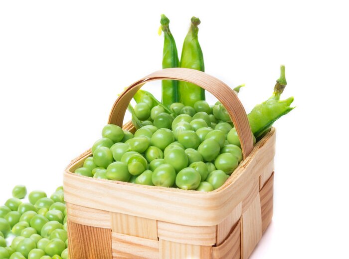 Papier peint  Petits pois verts dans un panier