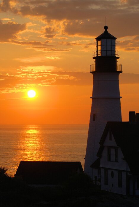 Papier peint  Phare et soleil couchant