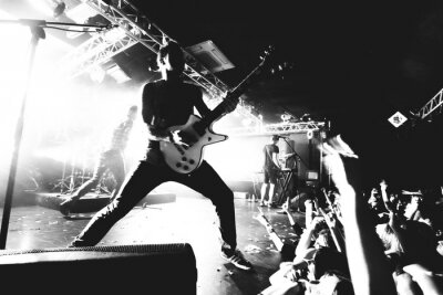 Papier peint  Photo en noir et blanc avec un guitariste