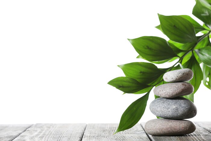 Papier peint  Pierres lisses disposées sur des planches grises