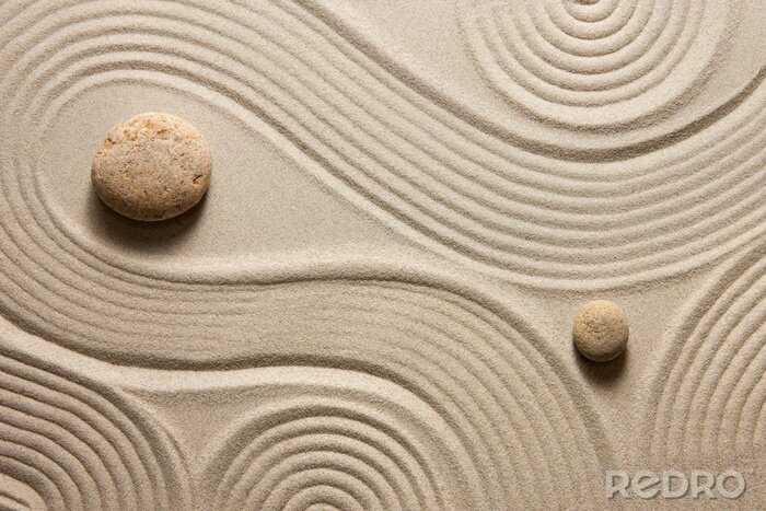 Papier peint  Pierres rondes sur le sable