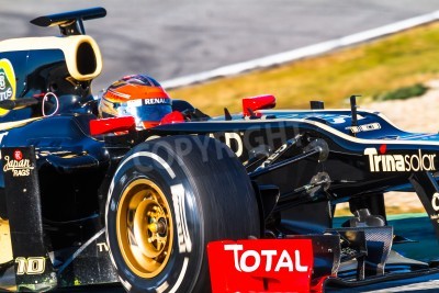 Papier peint  Pilote de course formule 1 dans un bolide