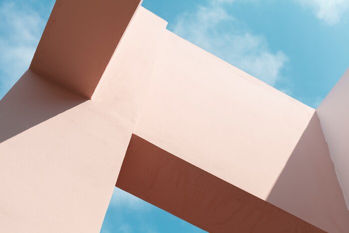 Papier peint  Pink facade structures under blue sky