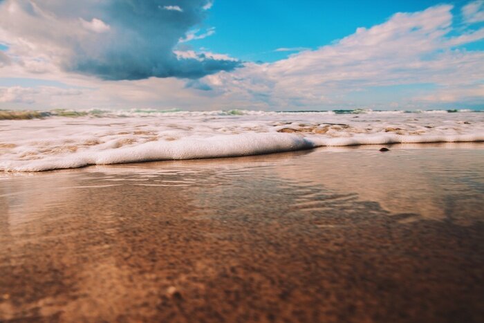 Papier peint  Plage et vague mousseuse