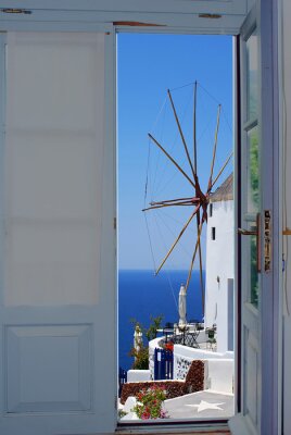 Papier peint  Porte avec vue sur un moulin à vent