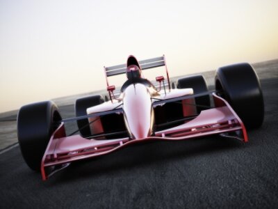 Papier peint  Race courses de voiture sur une vue piste de l'avant avec le flou de mouvement