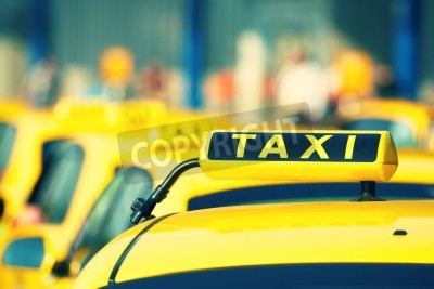 Papier peint  Rangée de taxis jaunes