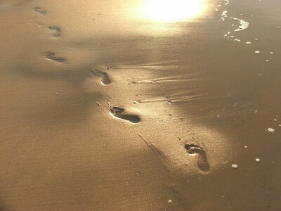 Papier peint  Réflexion des pieds sur la plage