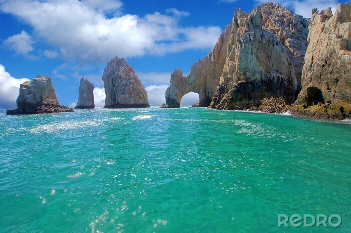 Papier peint  Roches grises et eau turquoise