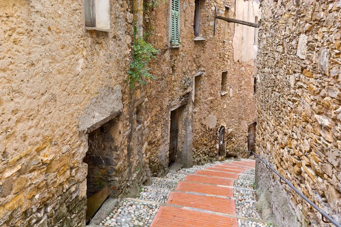 Papier peint  Rue entre des maisons en pierre