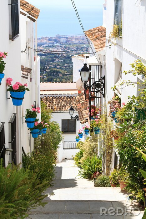 Papier peint  Ruelle avec un beau paysage