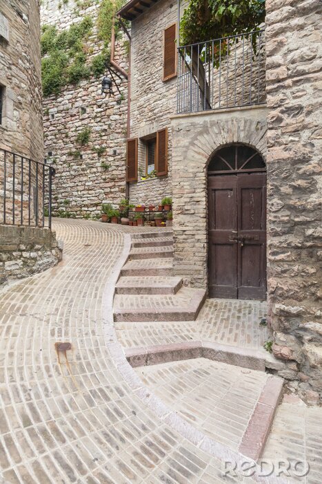 Papier peint  Ruelle en pierre claire avec un escalier