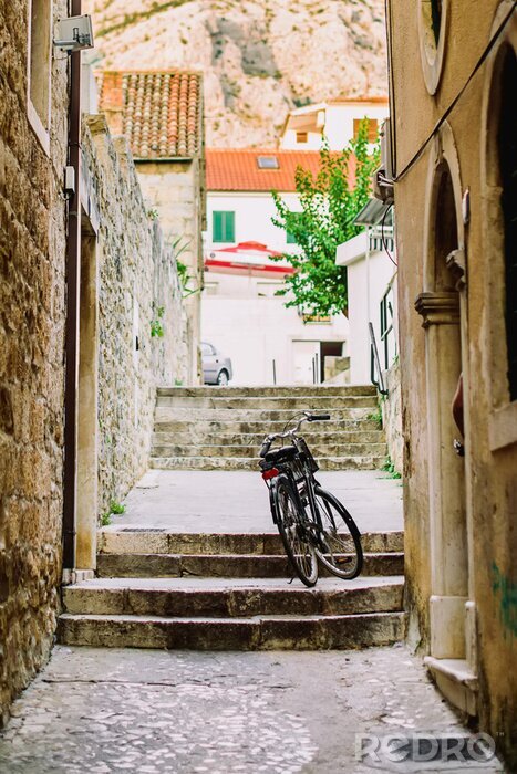 Papier peint  Ruelle étroite et vélo