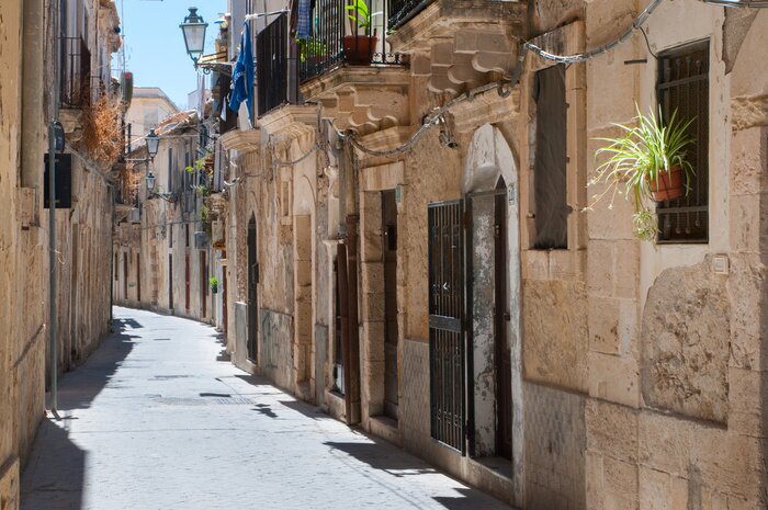 Papier peint  Ruelle tortueuse ensoleillée
