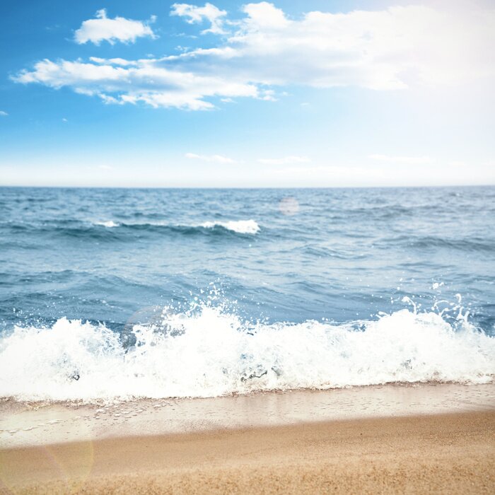 Papier peint  Sable et vagues de la mer