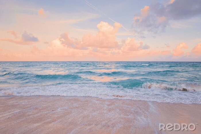 Papier peint  Sea ocean beach sunset sunrise landscape outdoor. Water wave with white foam. Beautiful sunset airy red sky with clouds. Natural aquatic blue pink turquoise aquamarine colorful background.