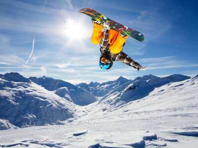 Papier peint  Snowboardeur effectuant des acrobaties dans la neige