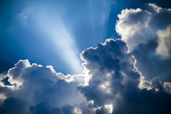 Papier peint  Soleil dans les nuages