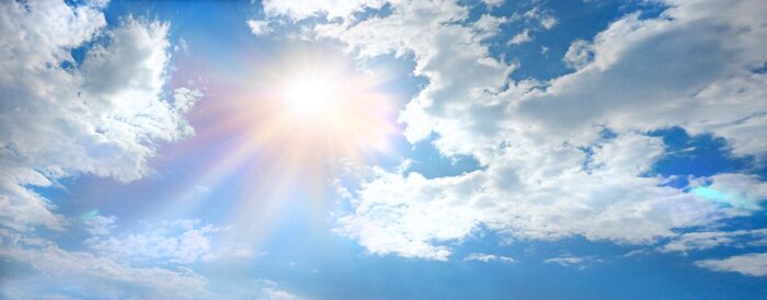 Papier peint  Soleil traversant les nuages