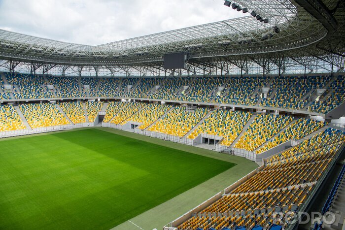 Papier peint  Stade avec des chaises jaunes