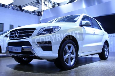 Papier peint  TANGSHAN - JUNE 2  Mercedes Benz luxury cars on display in a car sales shop on June 2, 2013,Tangshan, Hebei Province, China 