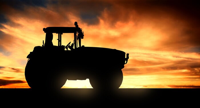 Papier peint  tracteur au coucher du soleil