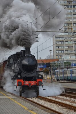 Papier peint  Train à vapeur au centre ville