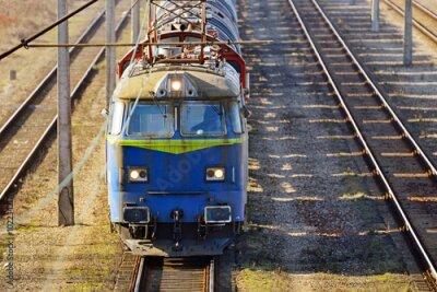 Papier peint  Train bleu sur les rails