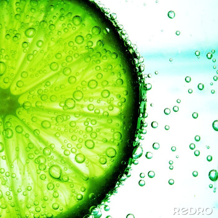 Papier peint  Tranche de citron vert et bulles d'eau