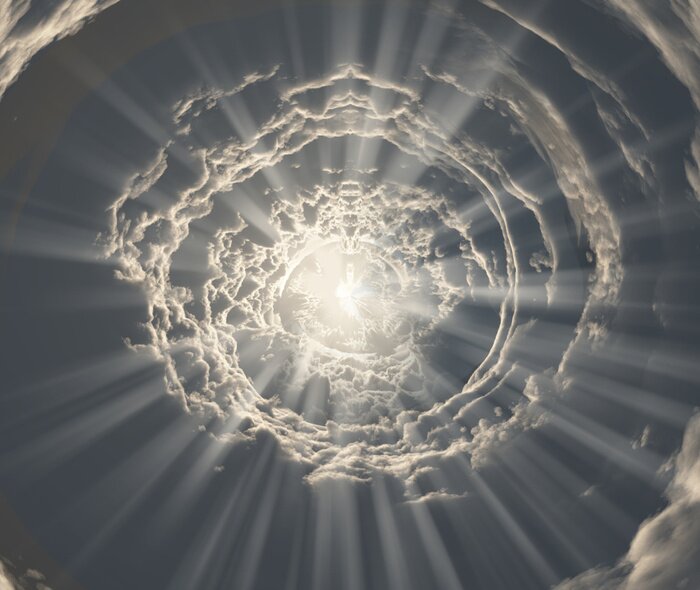 Papier peint  Tunnel de nuages et de lumière