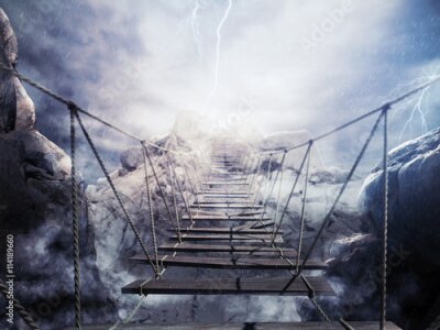 Papier peint  Un pont de corde au-dessus d'un gouffre dans la tempête
